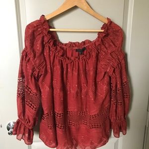 Rusty red colored peasant off-the-shoulder top